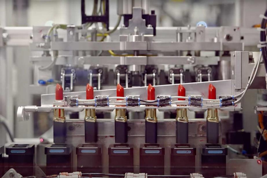 Lipsticks being manufactured in a factory for L'Oréal